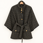 Giacca a cappa in tweed nero e oro con cintura