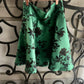 Gonna Valentina corta verde con fiori neri tessuto Douchesse
